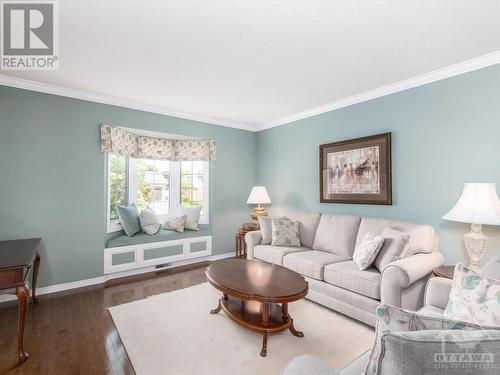Large living room with a window seat. - 9 Kinalea Crescent, Stittsville, ON - Indoor Photo Showing Living Room