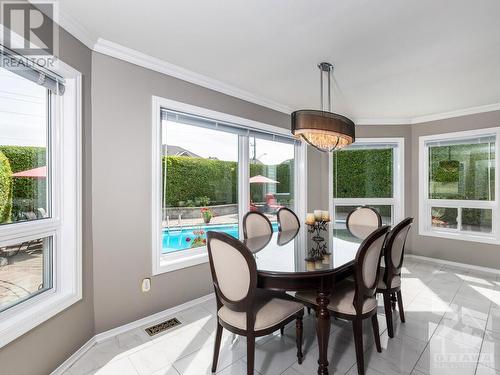 Huge eating area in the kitchen. Enjoy your morning coffee overlooking the pool. - 9 Kinalea Crescent, Stittsville, ON - Indoor Photo Showing Dining Room