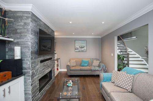 265 Fruitland Road, Stoney Creek, ON - Indoor Photo Showing Living Room With Fireplace