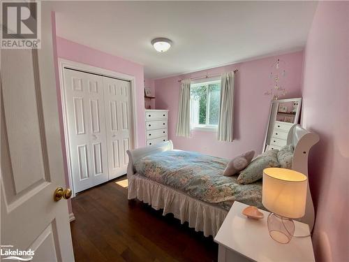 Bedroom with Closet Organizer - 1 Kirbys Way, Huntsville, ON - Indoor Photo Showing Bedroom