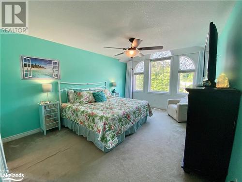 Primary Bedroom with 4-piece Ensuite - 1 Kirbys Way, Huntsville, ON - Indoor Photo Showing Bedroom