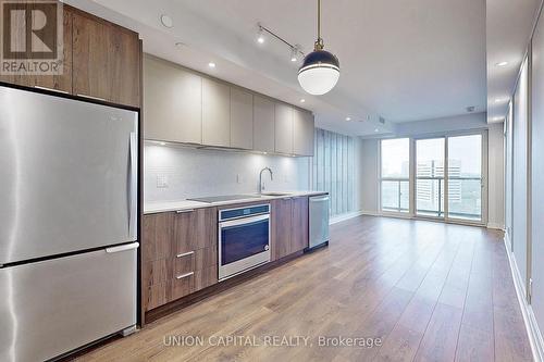 1406 - 2 Sonic Way, Toronto, ON - Indoor Photo Showing Kitchen With Upgraded Kitchen