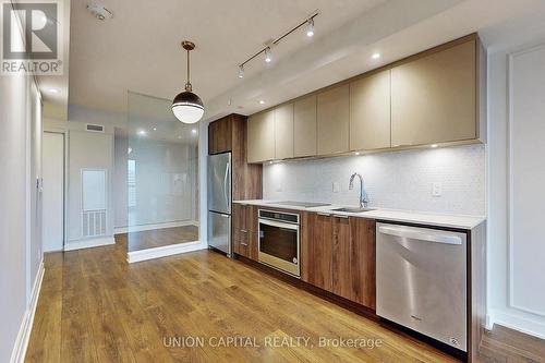 1406 - 2 Sonic Way, Toronto, ON - Indoor Photo Showing Kitchen With Upgraded Kitchen