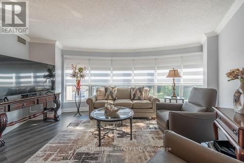 706 - 712 Rossland Road E, Whitby, ON - Indoor Photo Showing Living Room