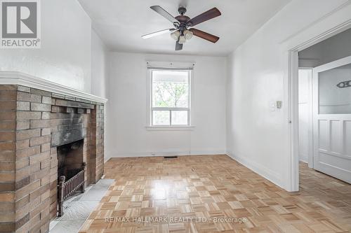 336 Mortimer Avenue, Toronto, ON - Indoor Photo Showing Other Room With Fireplace