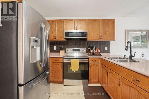 50 Compton Crescent, Bradford West Gwillimbury (Bradford), ON - Indoor Photo Showing Kitchen With Double Sink