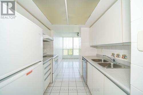 703 - 1 Rowntree Road, Toronto, ON - Indoor Photo Showing Kitchen With Double Sink