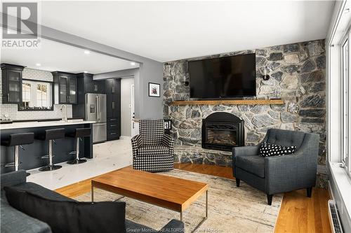 69 Thomas St, Dieppe, NB - Indoor Photo Showing Living Room With Fireplace