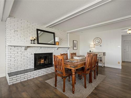 3780 Hammond Bay Rd, Nanaimo, BC - Indoor Photo Showing Dining Room With Fireplace