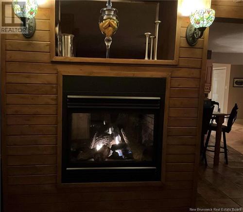 2556 Queen Elizabeth Drive, Bathurst, NB - Indoor Photo Showing Living Room With Fireplace