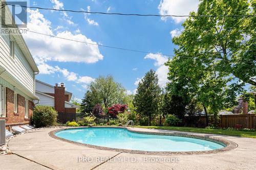 252 Walkers Line, Burlington, ON - Outdoor With In Ground Pool With Backyard