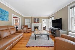 Front Living Room with Ornamental Fireplace (Virtually enhanced) - 