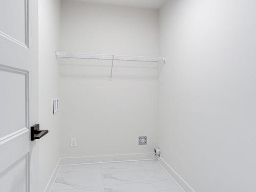 Laundry room - 1301-13570 Rue Des Saules, Mirabel, QC - Indoor With Storage