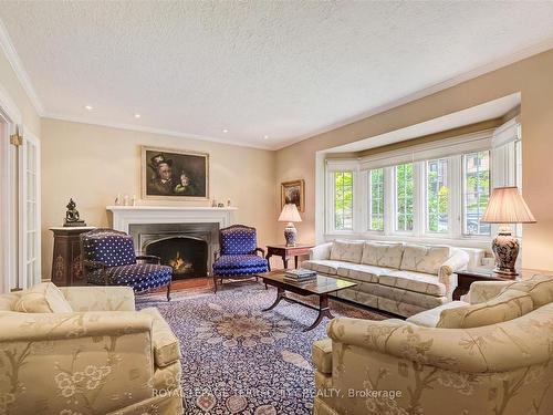 25 Poplar Plains Cres, Toronto, ON - Indoor Photo Showing Living Room With Fireplace