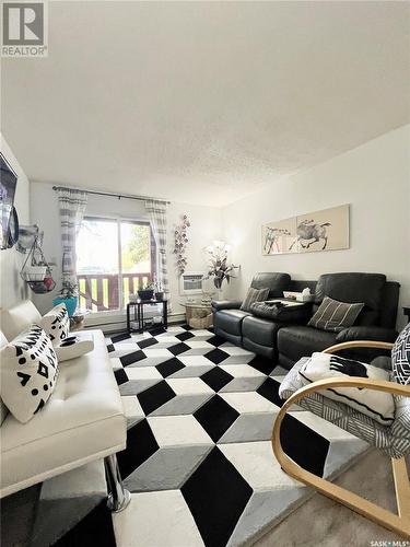 506 1580 Olive Diefenbaker Drive, Prince Albert, SK - Indoor Photo Showing Living Room