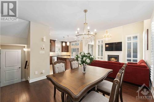 725 Wooler Place, Ottawa, ON - Indoor Photo Showing Dining Room With Fireplace