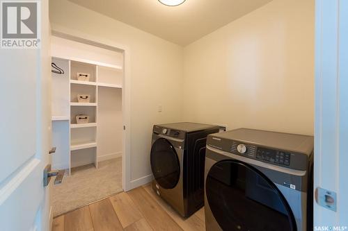 211 Flynn Bend, Saskatoon, SK - Indoor Photo Showing Laundry Room