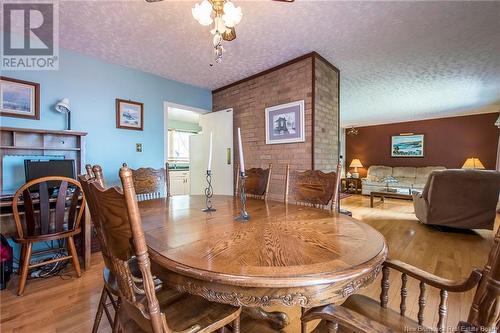 12 Baywatch Lane, Saint John, NB - Indoor Photo Showing Dining Room With Fireplace