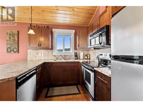 2633 Squilax Anglemont Road Unit# 184, Lee Creek, BC - Indoor Photo Showing Kitchen With Double Sink