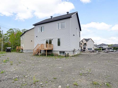 Backyard - 1101-13570 Rue Des Saules, Mirabel, QC - Outdoor With Exterior