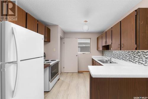 1159 Hastings Street, Moose Jaw, SK - Indoor Photo Showing Kitchen With Double Sink