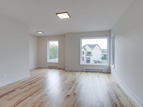 Living room - 1201-13570 Rue Des Saules, Mirabel, QC - Indoor Photo Showing Other Room