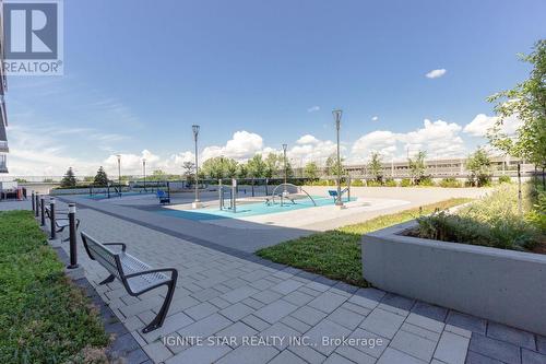 1004 - 2093 Fairview Street, Burlington, ON - Outdoor With In Ground Pool
