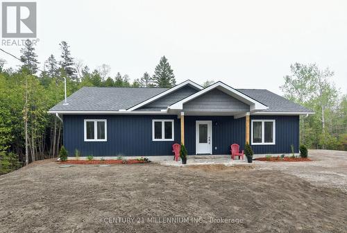 581 Pike Bay Road, Northern Bruce Peninsula, ON - Outdoor With Facade