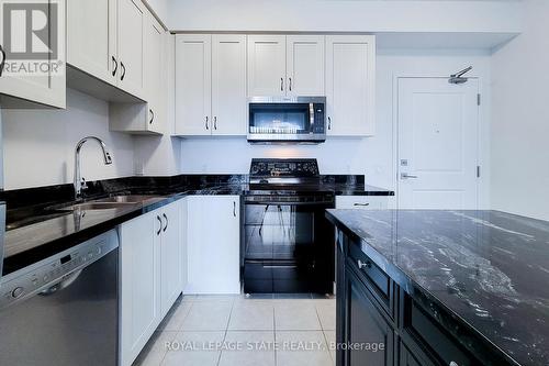 714 - 2490 Old Bronte Road, Oakville, ON - Indoor Photo Showing Kitchen With Double Sink