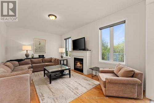 55 Logan Lane, Kawartha Lakes, ON - Indoor Photo Showing Living Room With Fireplace