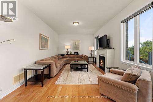 55 Logan Lane, Kawartha Lakes, ON - Indoor Photo Showing Living Room With Fireplace