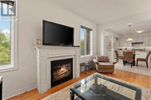 55 Logan Lane, Kawartha Lakes, ON - Indoor Photo Showing Living Room With Fireplace