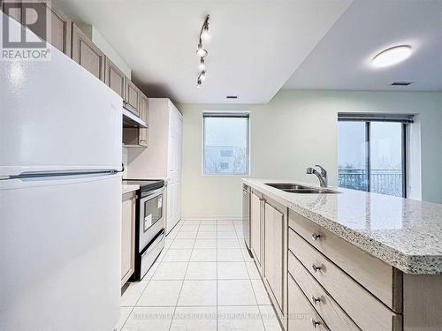 406 - 600 Eglinton Avenue E, Toronto, ON - Indoor Photo Showing Kitchen With Double Sink