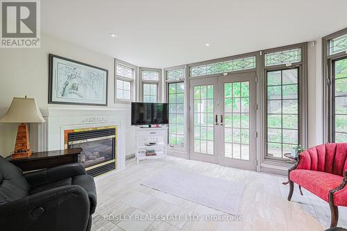 354 Bessborough Drive, Toronto, ON - Indoor Photo Showing Living Room With Fireplace