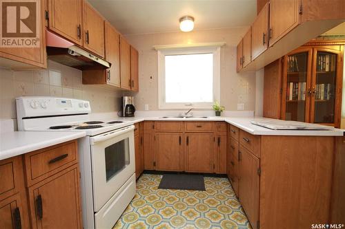1642 104Th Street, North Battleford, SK - Indoor Photo Showing Kitchen With Double Sink