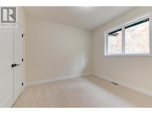 1229 Lone Pine Drive, Kelowna, BC - Indoor Photo Showing Other Room