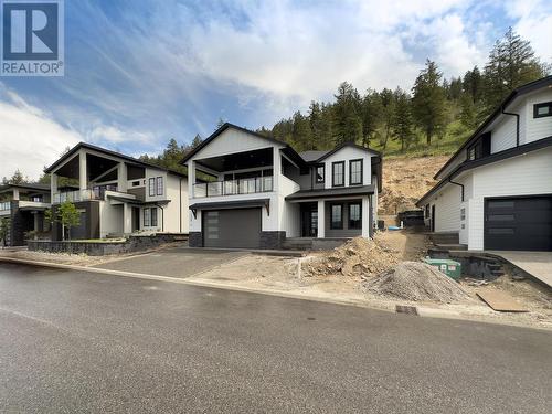 1229 Lone Pine Drive, Kelowna, BC - Outdoor With Facade