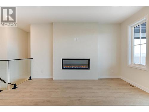 1229 Lone Pine Drive, Kelowna, BC - Indoor With Fireplace