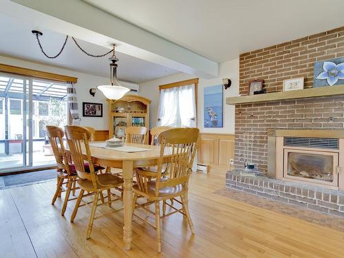 Dining room - 679  - 679A Rue Riopel, L'Épiphanie, QC - Indoor Photo Showing Dining Room With Fireplace