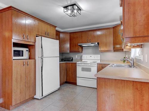 Kitchen - 23 Rue Du Zéphyr, Saint-Jean-Sur-Richelieu, QC - Indoor Photo Showing Kitchen With Double Sink