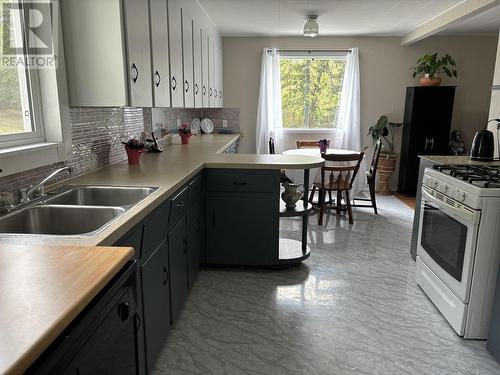 4046 Eagle Creek Road, 100 Mile House, BC - Indoor Photo Showing Kitchen With Double Sink