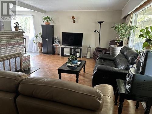 4046 Eagle Creek Road, 100 Mile House, BC - Indoor Photo Showing Living Room With Fireplace