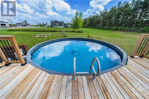 313 Moore Crescent, Kemptville, ON - Outdoor With Above Ground Pool With Deck Patio Veranda With Backyard