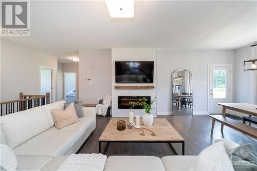 313 Moore Crescent, Kemptville, ON - Indoor Photo Showing Living Room With Fireplace