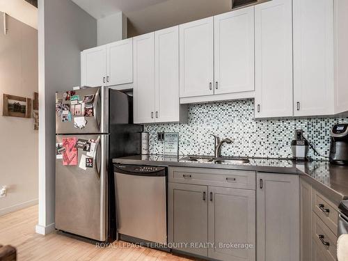 303-766 King St W, Toronto, ON - Indoor Photo Showing Kitchen With Double Sink