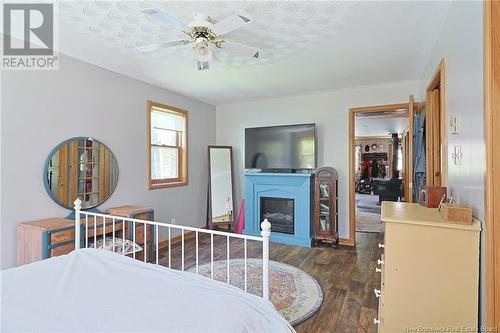 359 Giants Glen Road, Stanley, NB - Indoor Photo Showing Bedroom With Fireplace