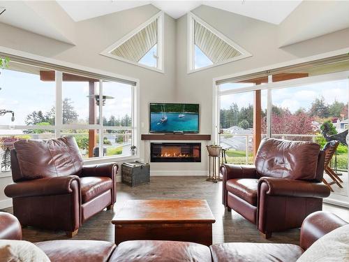 303-439 College Rd, Qualicum Beach, BC - Indoor Photo Showing Living Room With Fireplace