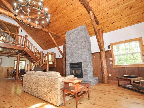 27 Little Sand Lake, District Of Kenora, ON - Indoor Photo Showing Other Room With Fireplace