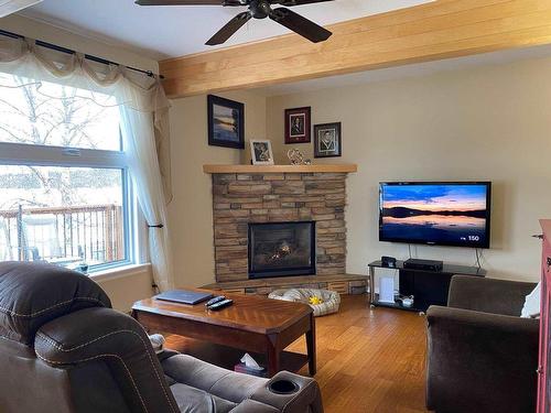 141 Sunset Drive, Schreiber, ON - Indoor Photo Showing Living Room With Fireplace