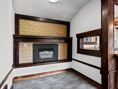 644 Pleasant Street, Kamloops, BC - Indoor Photo Showing Living Room With Fireplace